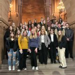 Youth as Leaders group stands on Million Dollar staircase.