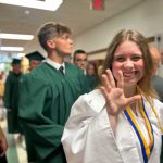 Students in cap and gowns.