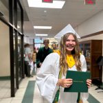 Students in cap and gowns.