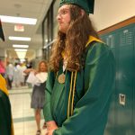 Students in cap and gowns.