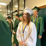 Students in cap and gowns.