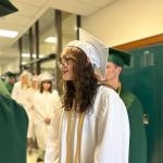 Students in cap and gowns.