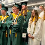 Students in cap and gowns.