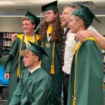 Students in cap and gowns.