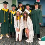 Students in cap and gowns.