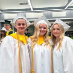 Students in cap and gowns.