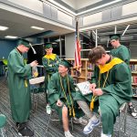 Students in cap and gowns.