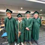 Students in cap and gowns.