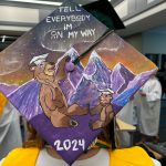 Student graduation cap decorated with bears, mountains and "Tell everybody I'm on my way. 2024"