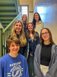 Six members of the MCS Student Council stand together on stairway.