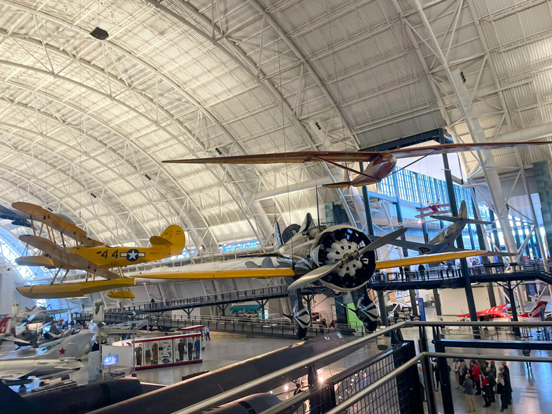 Several airplanes suspended from ceiling at Smithsonian Air and Space Museum