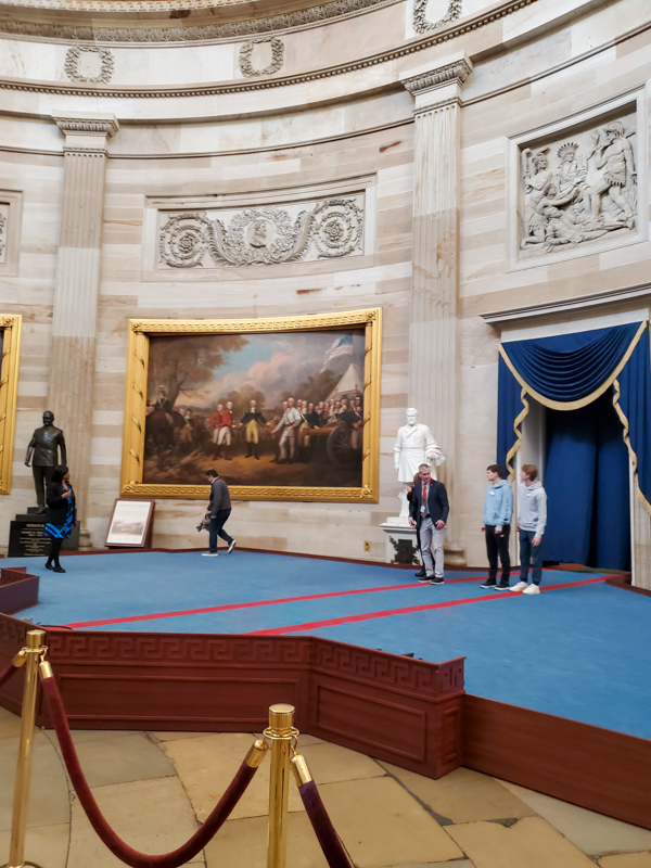 U.S. Capitol Rotunda. Painting of George Washington in background.