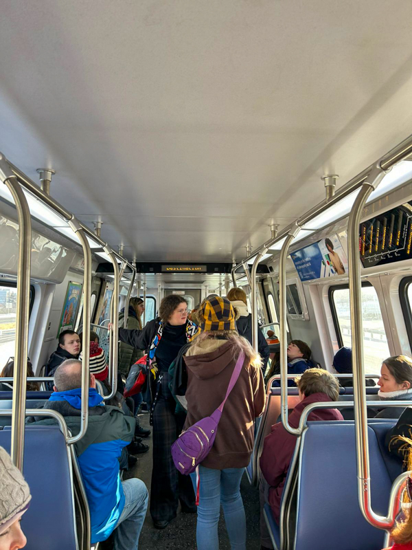 Students on subway train.