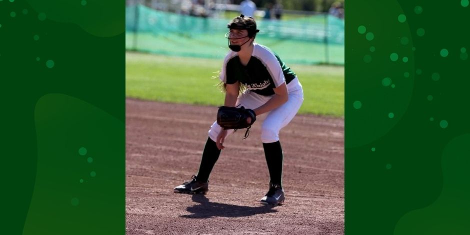 Student plays softball.